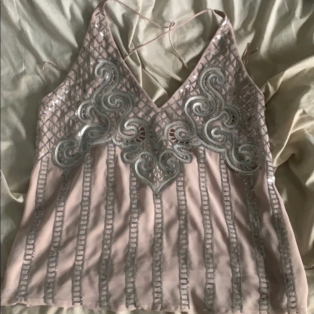 Super sparkly open back top